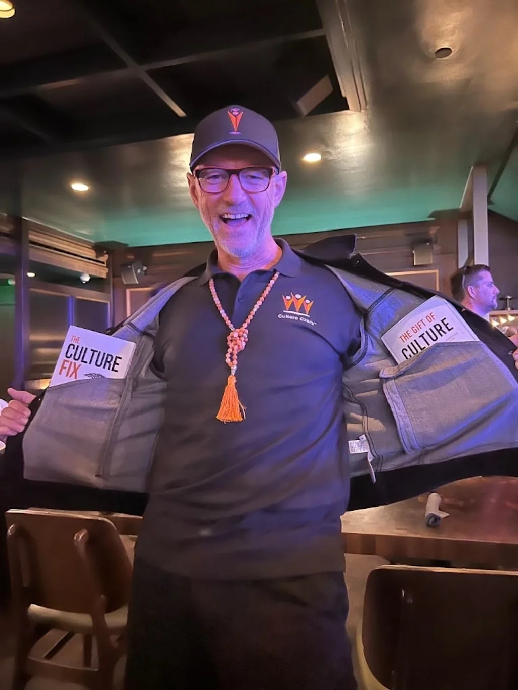 Will Scott holds two awards at an event.